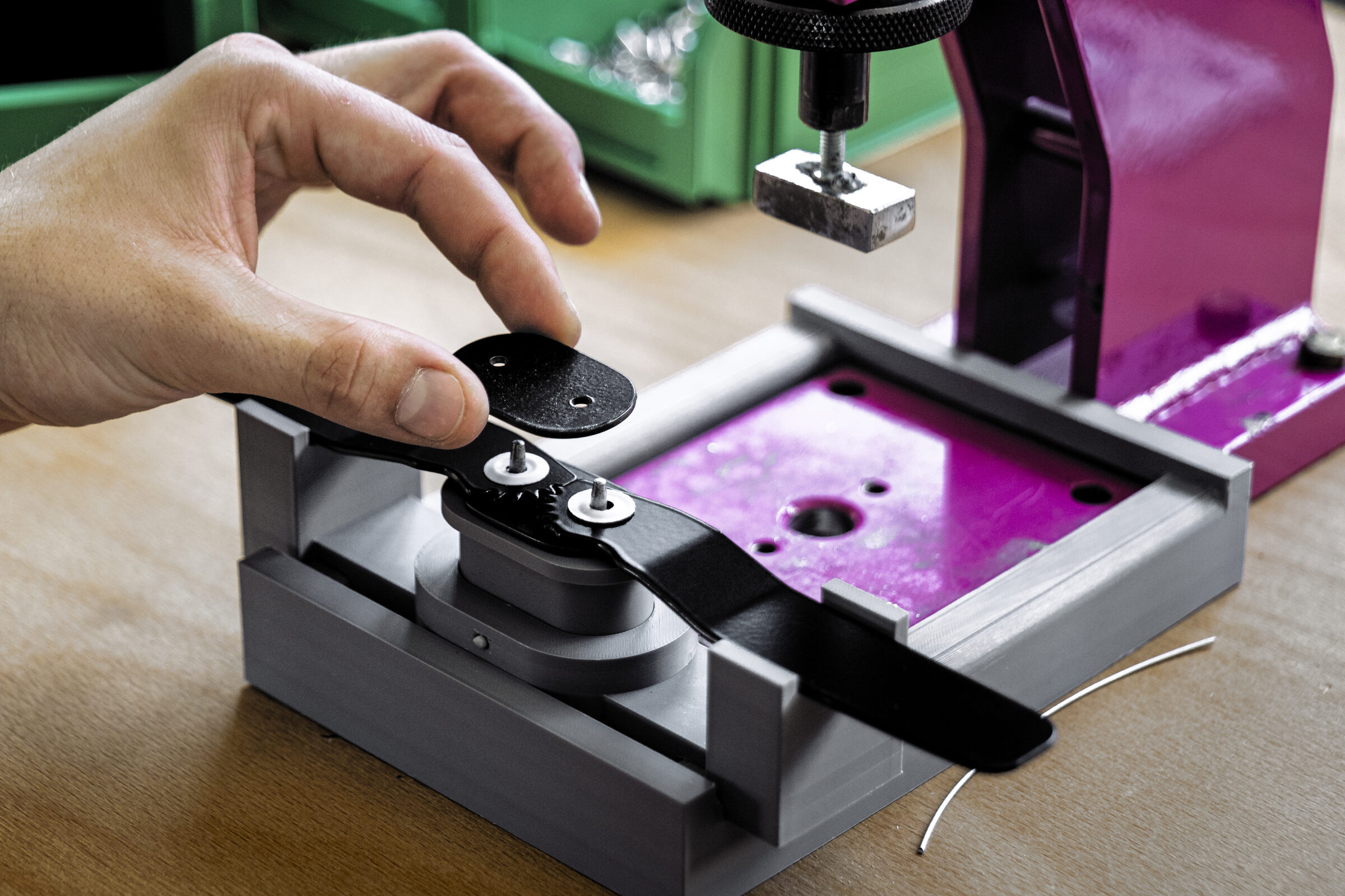3D-printed assembly jig in use during production