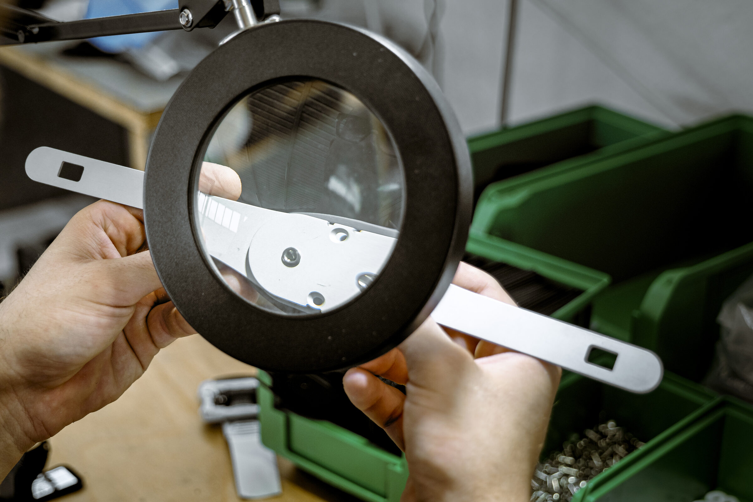 Quality control with magnifying lamp